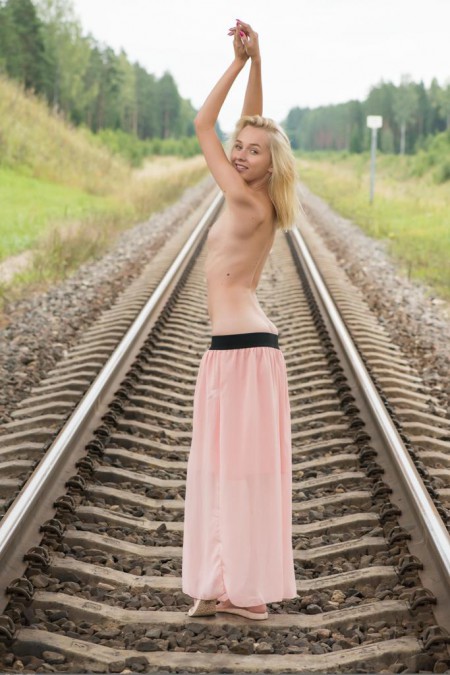 Ronda posing on A railroad