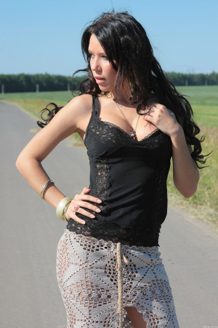 Sabina posing on A country road