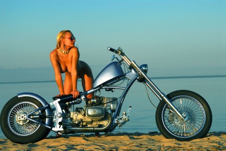 Blonde with natural Breasts  on a motorcycle